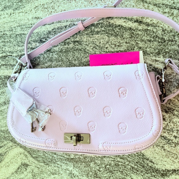 Betsey Johnson Handbags - Betsey Johnson Lavender Purple Embossed Skull Crossbody Bag w Shoulder Strap NWT